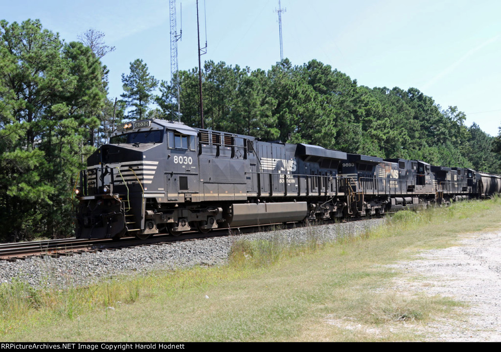 NS 8030 leads two other GE's and empty grain train 51X westbound